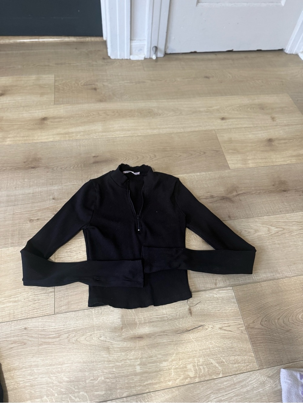 Black quarter zip fitted long sleeve athletic top
